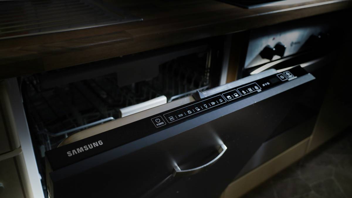 easy to use dishwashers with intuitive control panel and open door showing clean dishes
